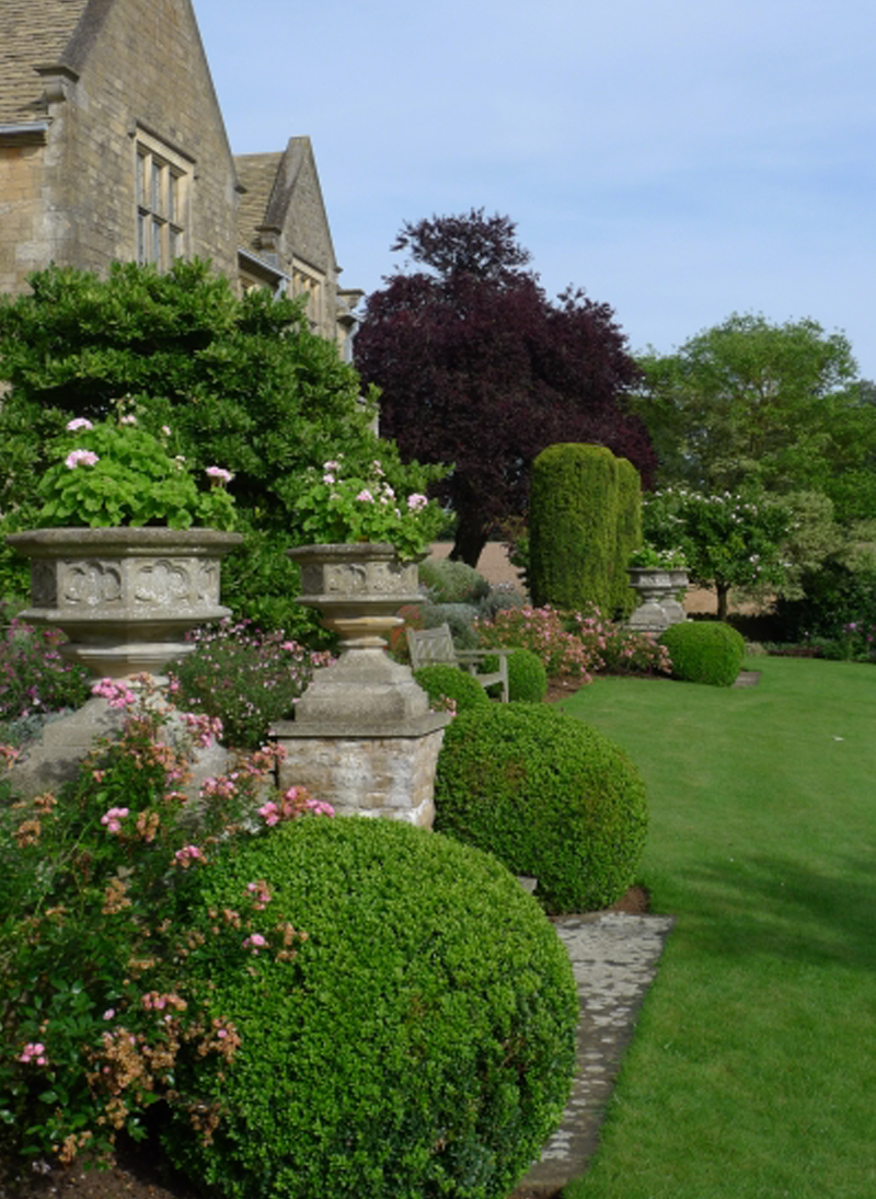 A view across the front of the house to the gardens beyond.