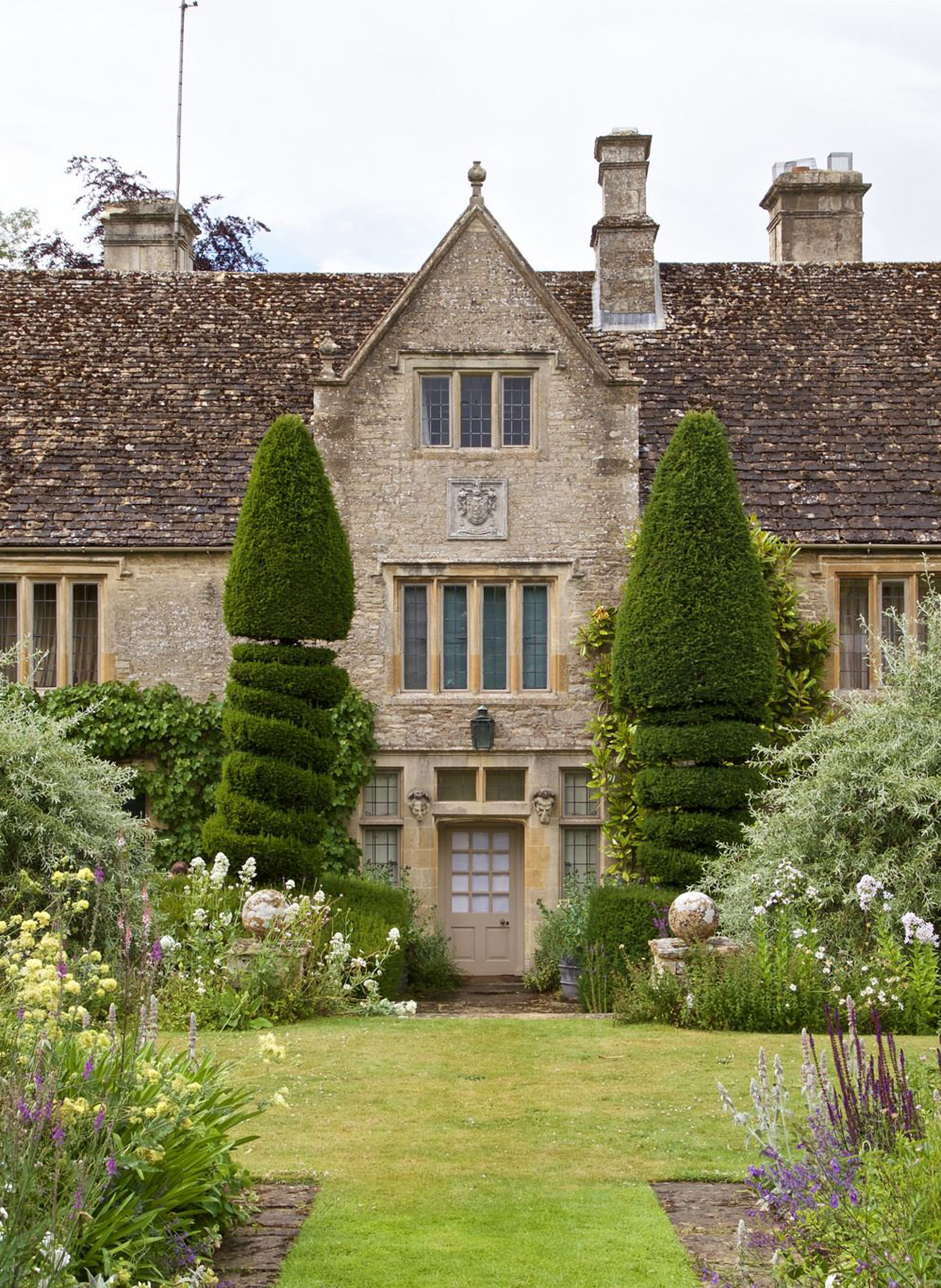 A view across the front lawns to the house beyond.